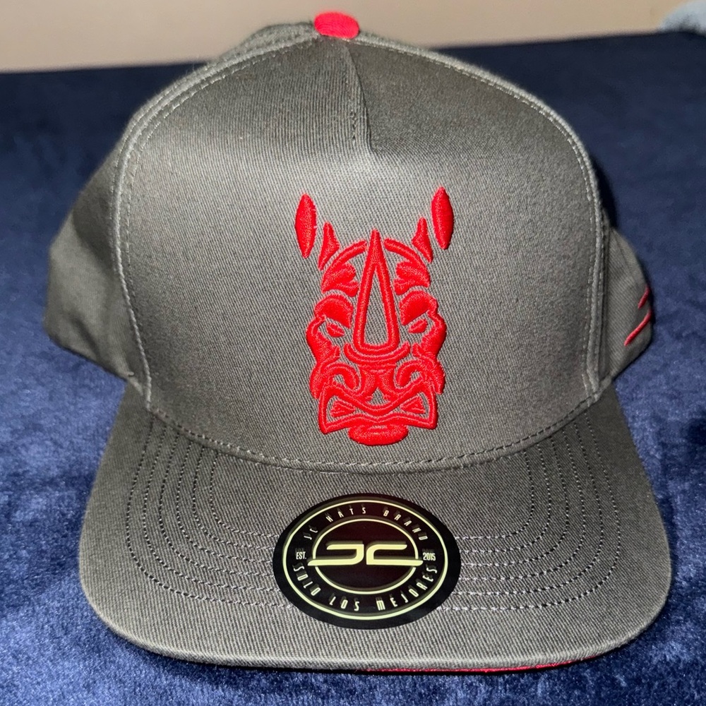 A NEW SnapBack hat, size 7 1/8 , rhino logo